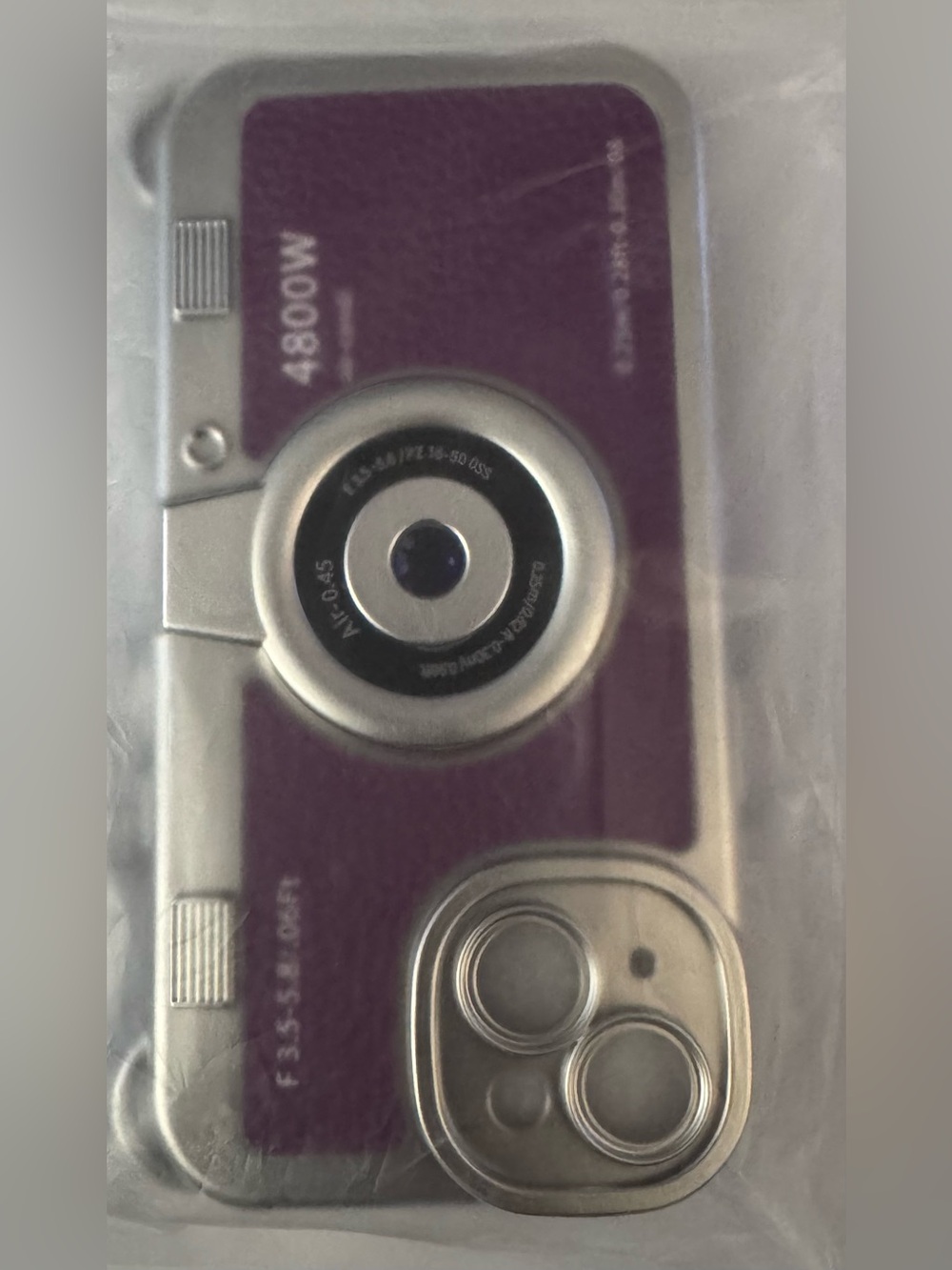Compact Purple Digital Camera with Silver Accents for iPhone 15